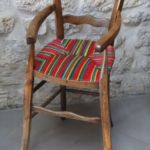 Chaise haute chinée, réservée, couleurs demandée.